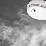 Smoke detectors are crucial for ensuring the safety of your home. In case your smoke detector is malfunctioning or beeping due to a low battery, you might need to locate and reset the corresponding circuit breaker to resolve the issue. This guide will help you identify which breaker controls your smoke detector and provide step-by-step instructions, along with necessary materials and measurements, to help you reset it. Materials and Measurements: Screwdriver: You may need a Phillips or flathead screwdriver. Flashlight: A flashlight will be helpful for inspecting the wiring and breaker panel. Safety Equipment: Wear safety glasses and gloves for added protection. Step-by-Step Instructions: Step 1: Identify the Smoke Detector Locate your smoke detector in your home. It is typically mounted on the ceiling or high on the wall, often near bedrooms or common areas. Step 2: Inspect the Smoke Detector Check the smoke detector for any visible model or brand information. Make a note of this information, as it may be useful in the future. Step 3: Disable the Smoke Detector Use a ladder or a secure platform to reach the smoke detector. Twist the smoke detector counterclockwise to remove it from its mounting bracket or gently pry it open, depending on the model. Step 4: Check the Smoke Detector for Battery Compartment Some smoke detectors have a battery compartment. If it does, open it and replace the battery with a new one if it's low. Step 5: Locate the Breaker Panel Find your electrical breaker panel or fuse box. This is typically in a basement, garage, utility room, or another designated area of your home. Step 6: Turn on Your Flashlight Ensure your flashlight is working properly. Step 7: Identify the Correct Breaker Open the breaker panel cover using a screwdriver. Shine your flashlight on the breakers and locate the one labeled "Smoke Detector" or "Fire Alarm." If your breaker panel is not labeled, you may need to do some trial and error to identify the right breaker. If you cannot find a specific label, it might be connected to the breaker for the bedroom or hallway lights. Step 8: Switch Off the Breaker Flip the identified breaker switch to the "OFF" position. Step 9: Replace and Test the Smoke Detector Return to the smoke detector and reattach it to its mounting bracket or close it securely. Ensure the battery compartment is secured if applicable. Go back to the breaker panel and switch the breaker back to the "ON" position. Step 10: Test the Smoke Detector Press the test button on the smoke detector to confirm it's working correctly. You should hear a loud, continuous beep. Step 11: Reassemble and Cleanup Reattach the breaker panel cover. Safely store your tools and equipment. By following these instructions, you can identify and reset the breaker controlling your smoke detector, ensuring the safety of your home and peace of mind. If you encounter any issues or doubts, consider consulting a qualified electrician for further assistance.